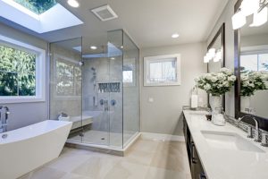 The interior of a bathroom with a glass shower door