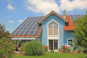 a home with solar panels and ecofriendly windows